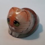 Кот Снежок в тапочке